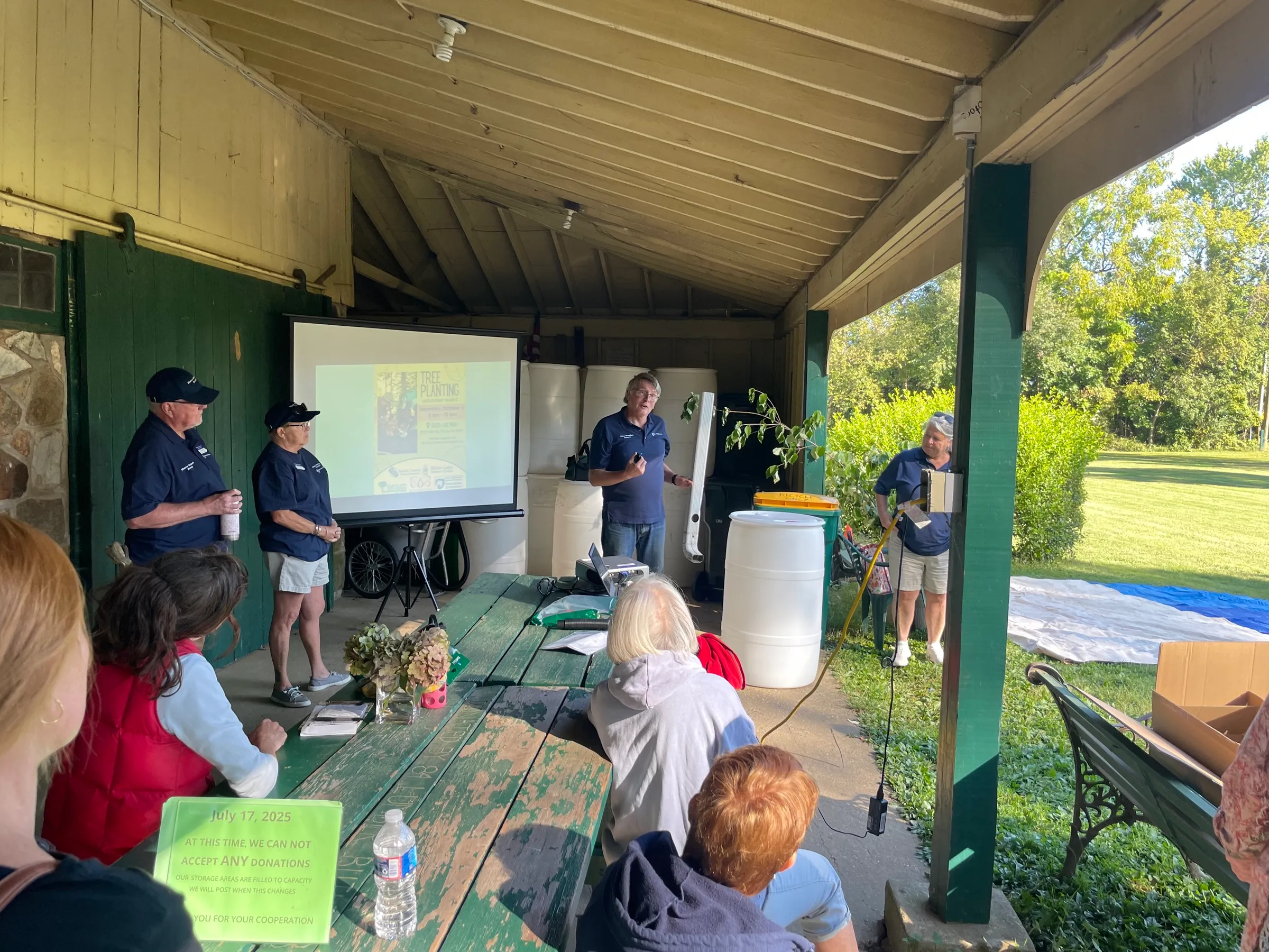 Community members learning about watershed conservation at a workshop